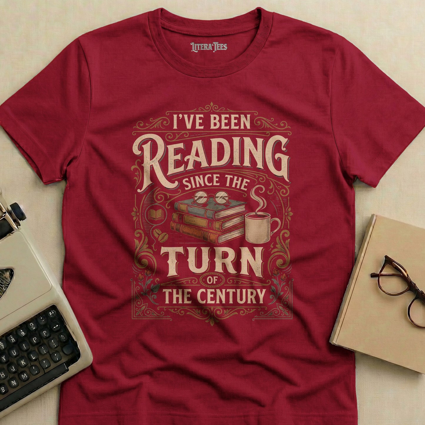 Maroon t-shirt with "I've been reading since the turn of the century" graphic.