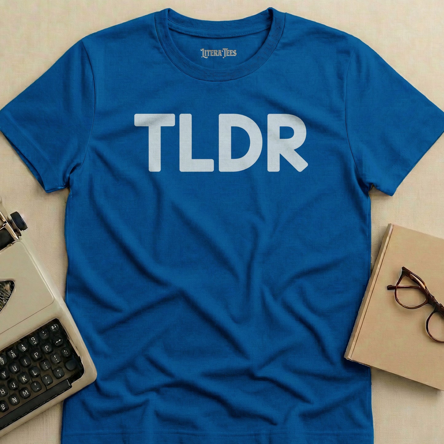 Blue t-shirt with "TLDR" printed in white uppercase letters.