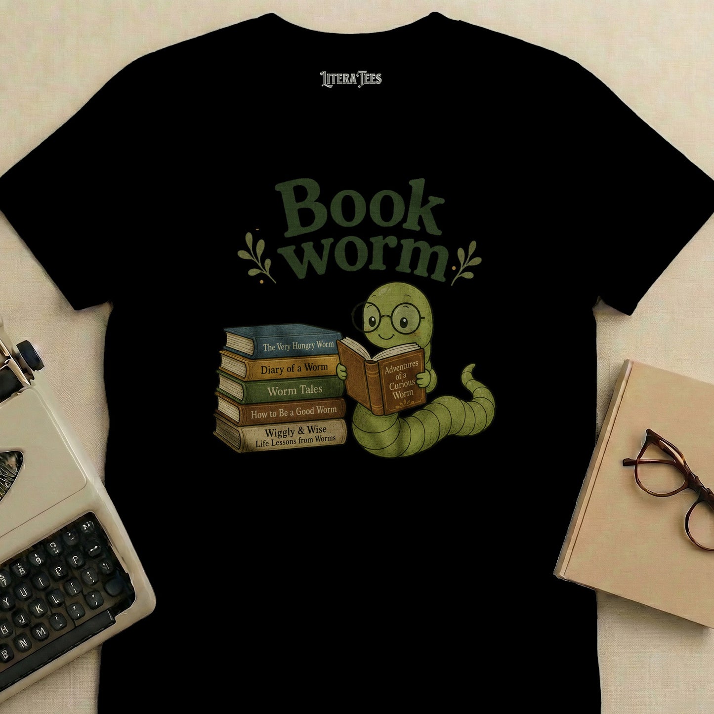 Black t-shirt with "Book worm" text and illustration of a worm reading books.
