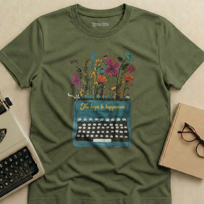 Green t-shirt with a vintage typewriter design and the text "The keys to happiness".