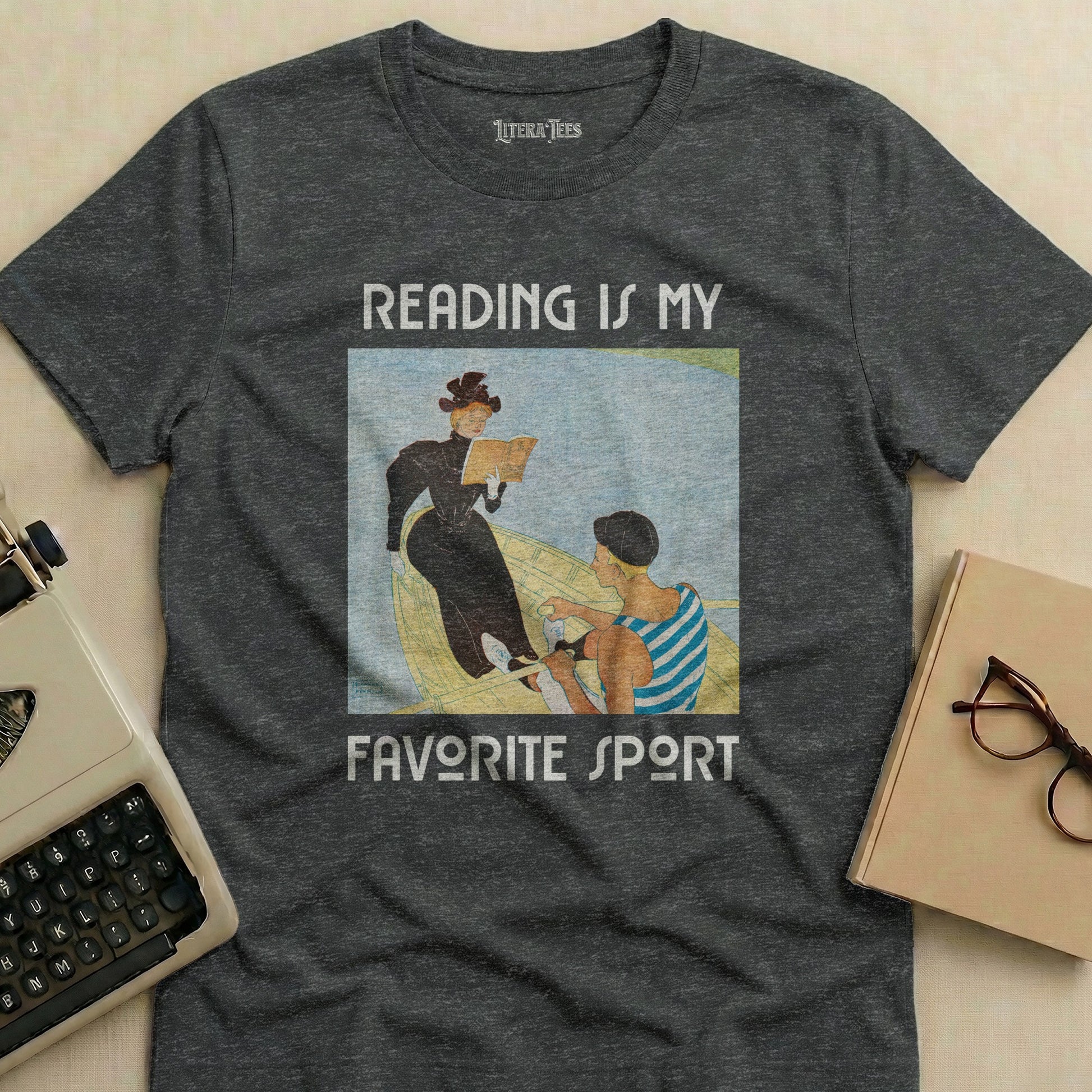 T-shirt with "Reading is my favorite sport" text and illustration of two women reading in a boat.