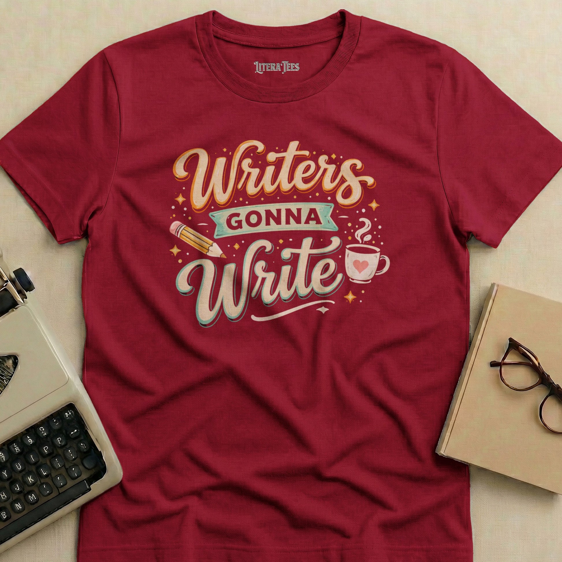 Maroon t-shirt with "Writers Gonna Write" text and pencil graphic.
