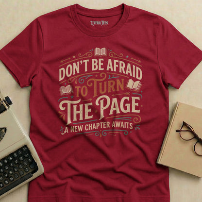 Red t-shirt with "Don't be afraid to turn the page" and book graphics.