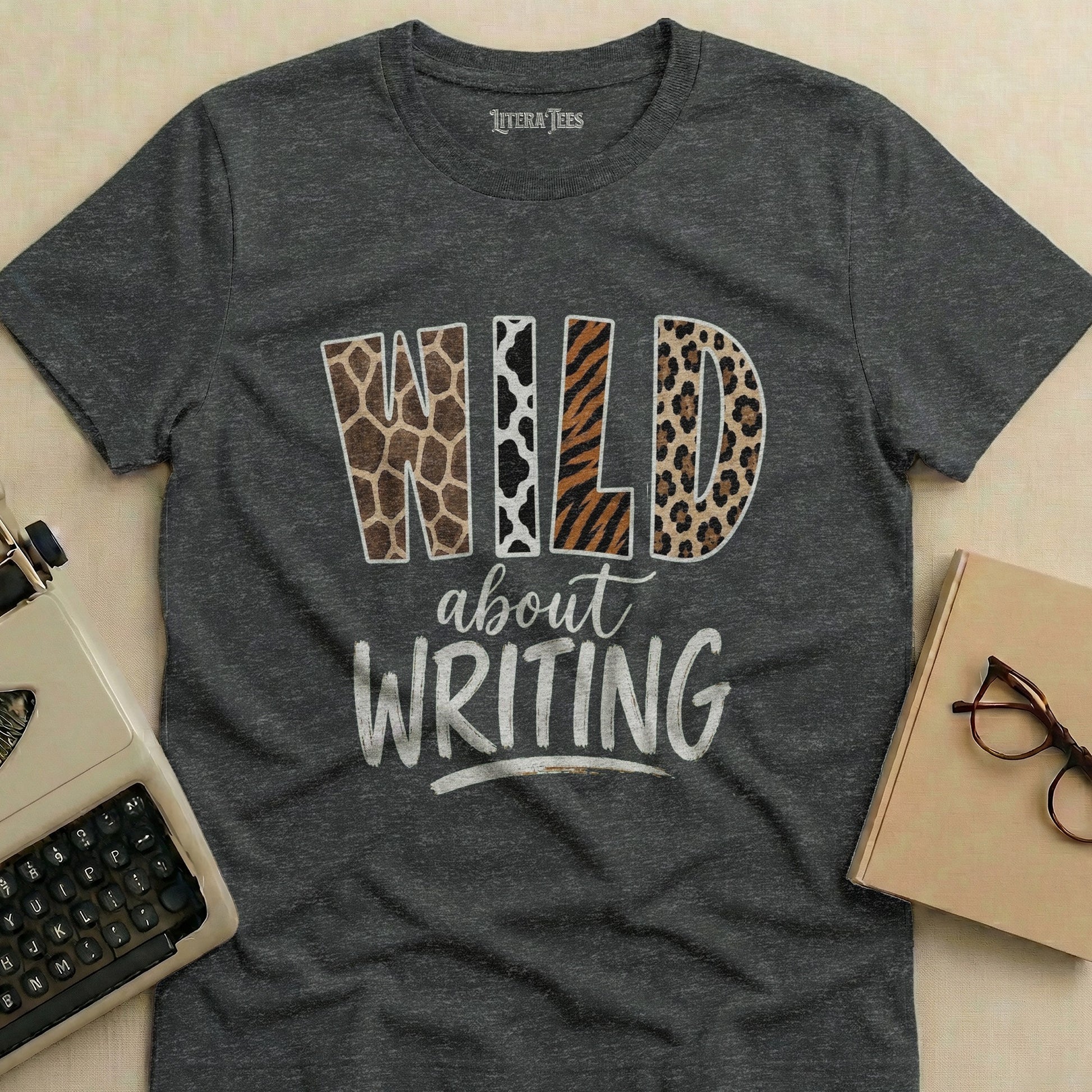 Dark gray t-shirt with "Wild about Writing" in animal print lettering.