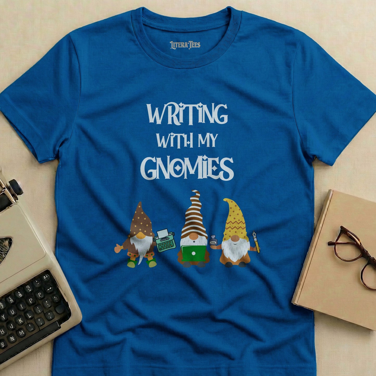 Blue t-shirt with "WRITING WITH MY GNOMIES" and three gnomes.