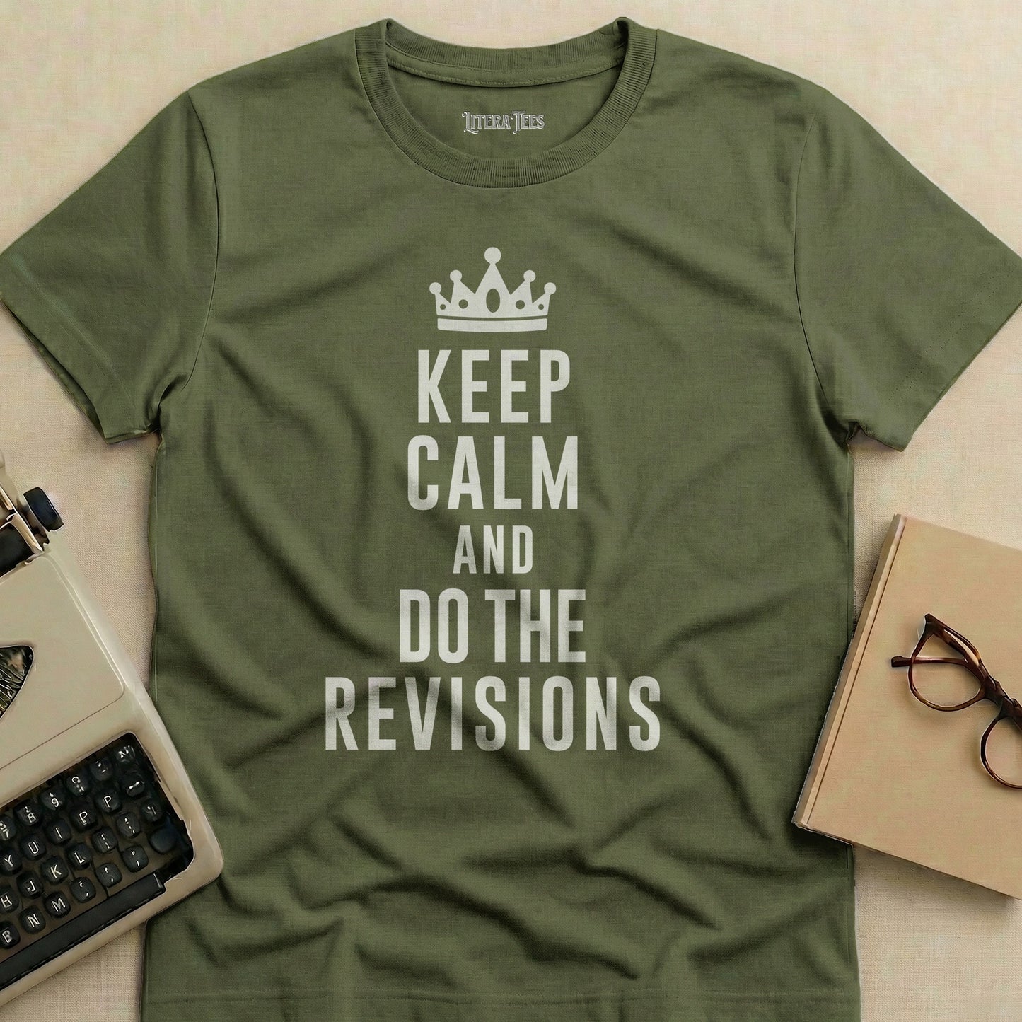 Olive green t-shirt with white text "KEEP CALM AND DO THE REVISIONS".