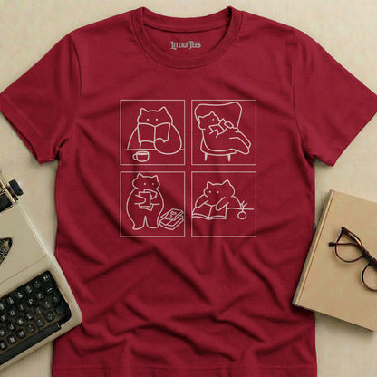 Four simple line drawings of cats reading books on a maroon t-shirt.