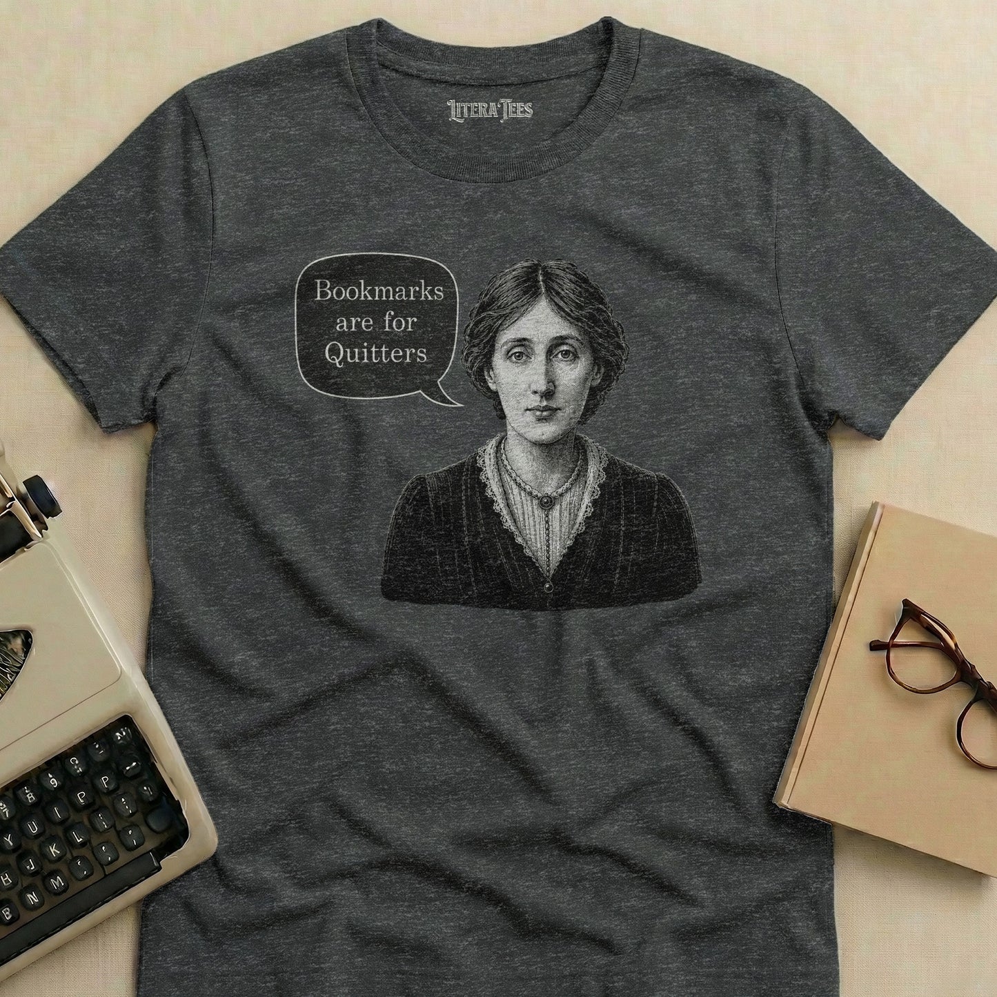 T-shirt with portrait and speech bubble saying "Bookmarks are for Quitters."