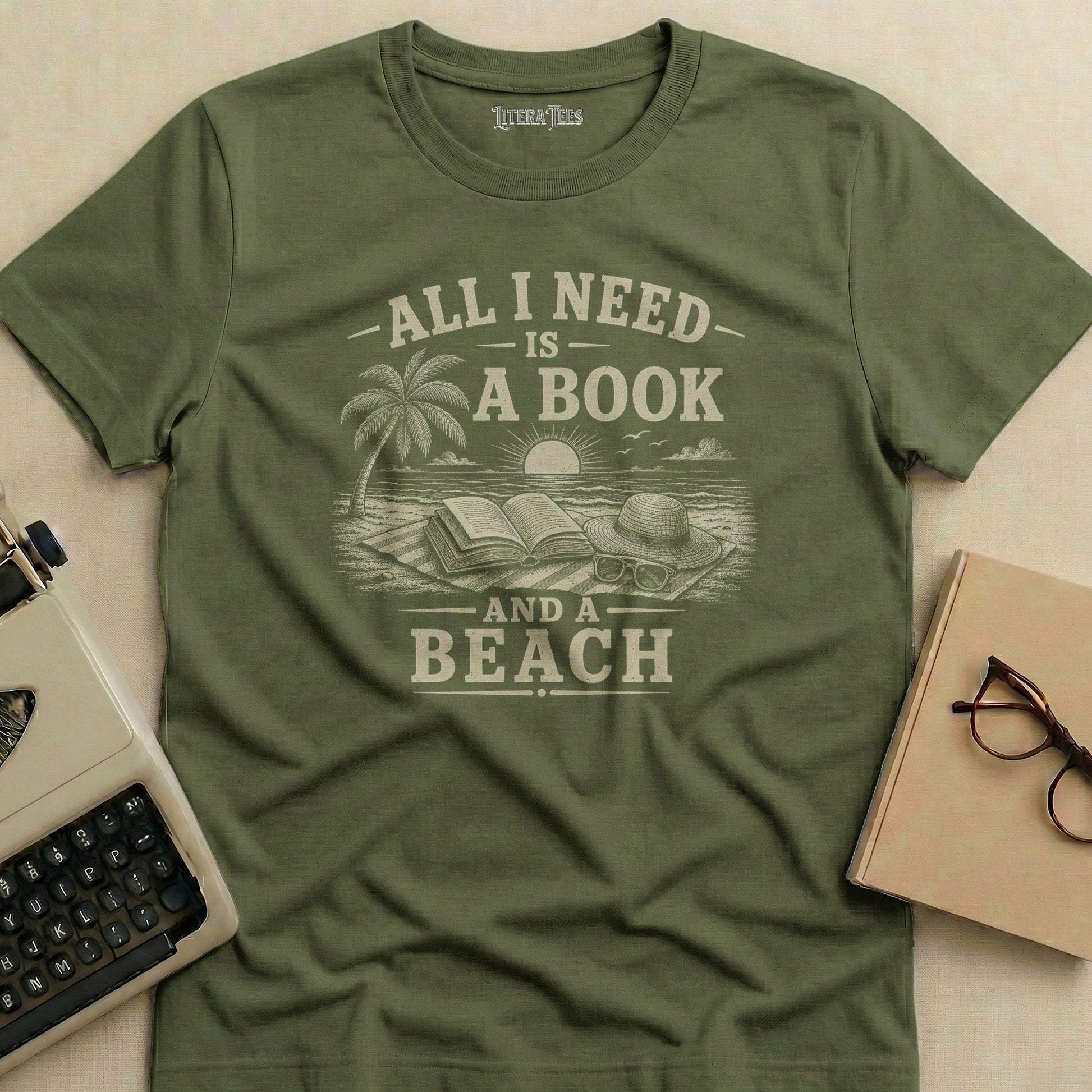 Olive t-shirt with "All I Need is a Book and a Beach" text and beach scene.