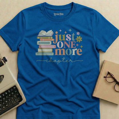 Blue t-shirt with "just ONE more chapter" and stacked books design.