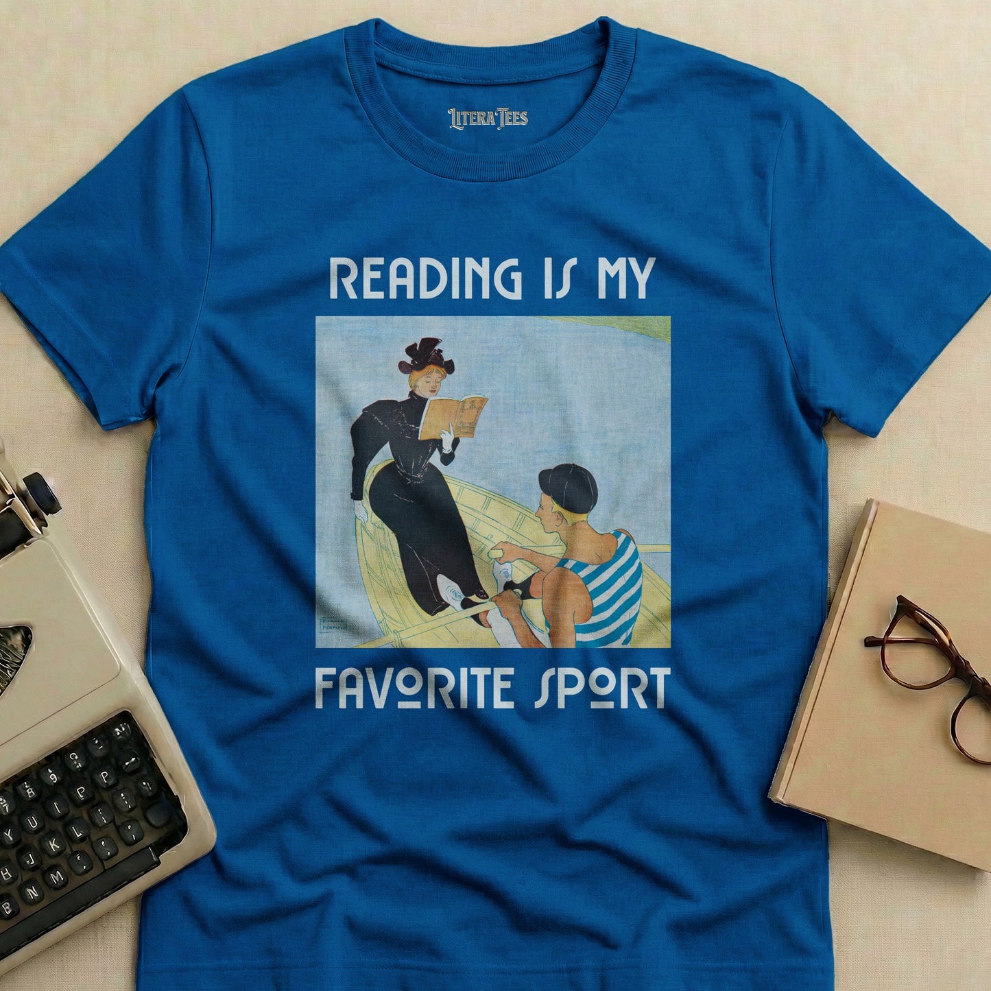 Blue t-shirt with "Reading is My Favorite Sport" text and vintage illustration.