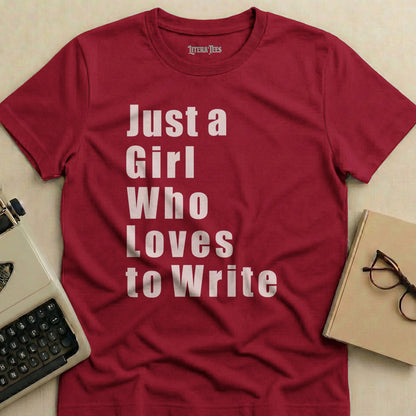 Maroon t-shirt with "Just a Girl Who Loves to Write" in white text.