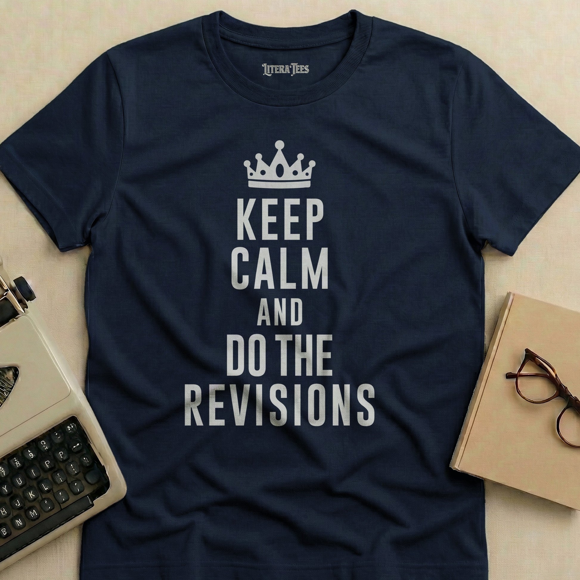 Navy t-shirt with white text "Keep Calm and Do the Revisions" and a crown.