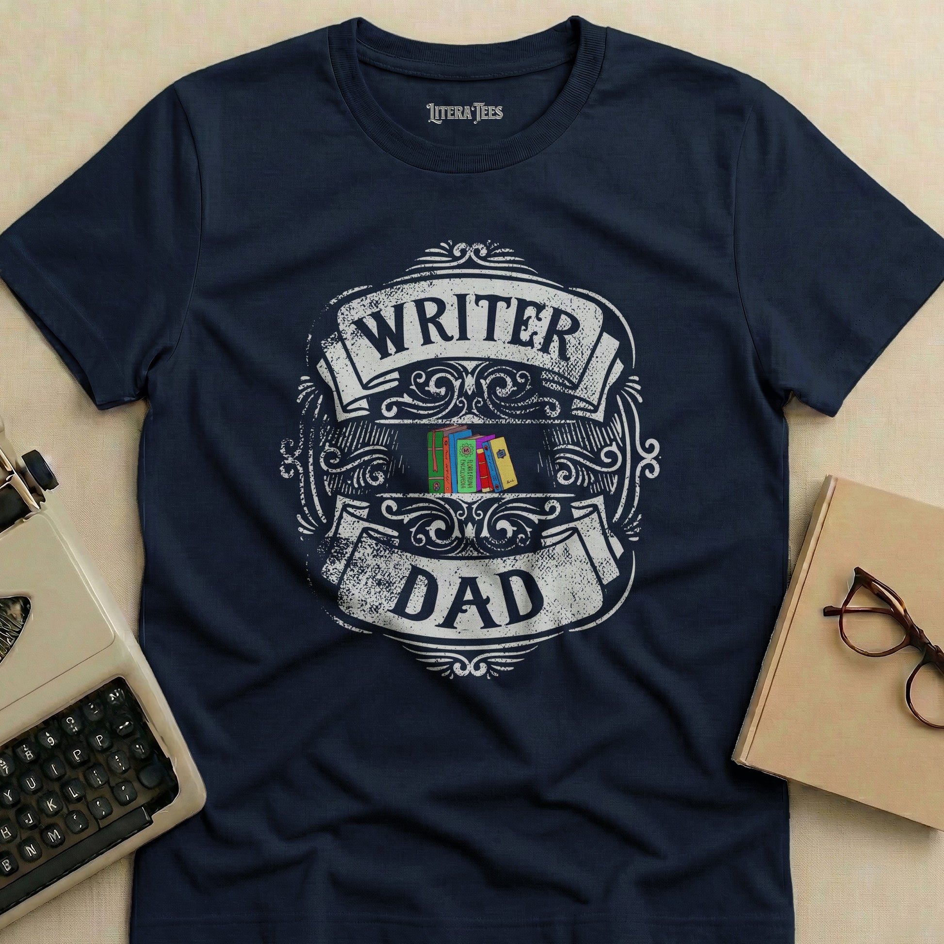 Navy t-shirt with "Writer Dad" text and colorful book design.
