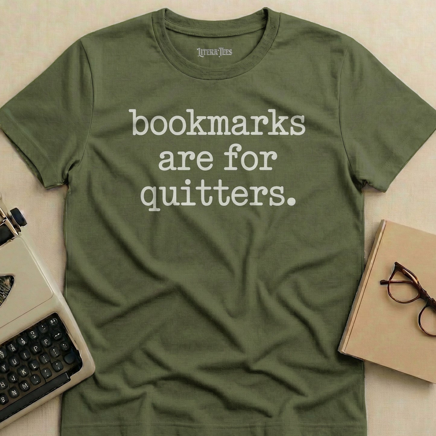 Olive green t-shirt with "Bookmarks are for quitters." text.
