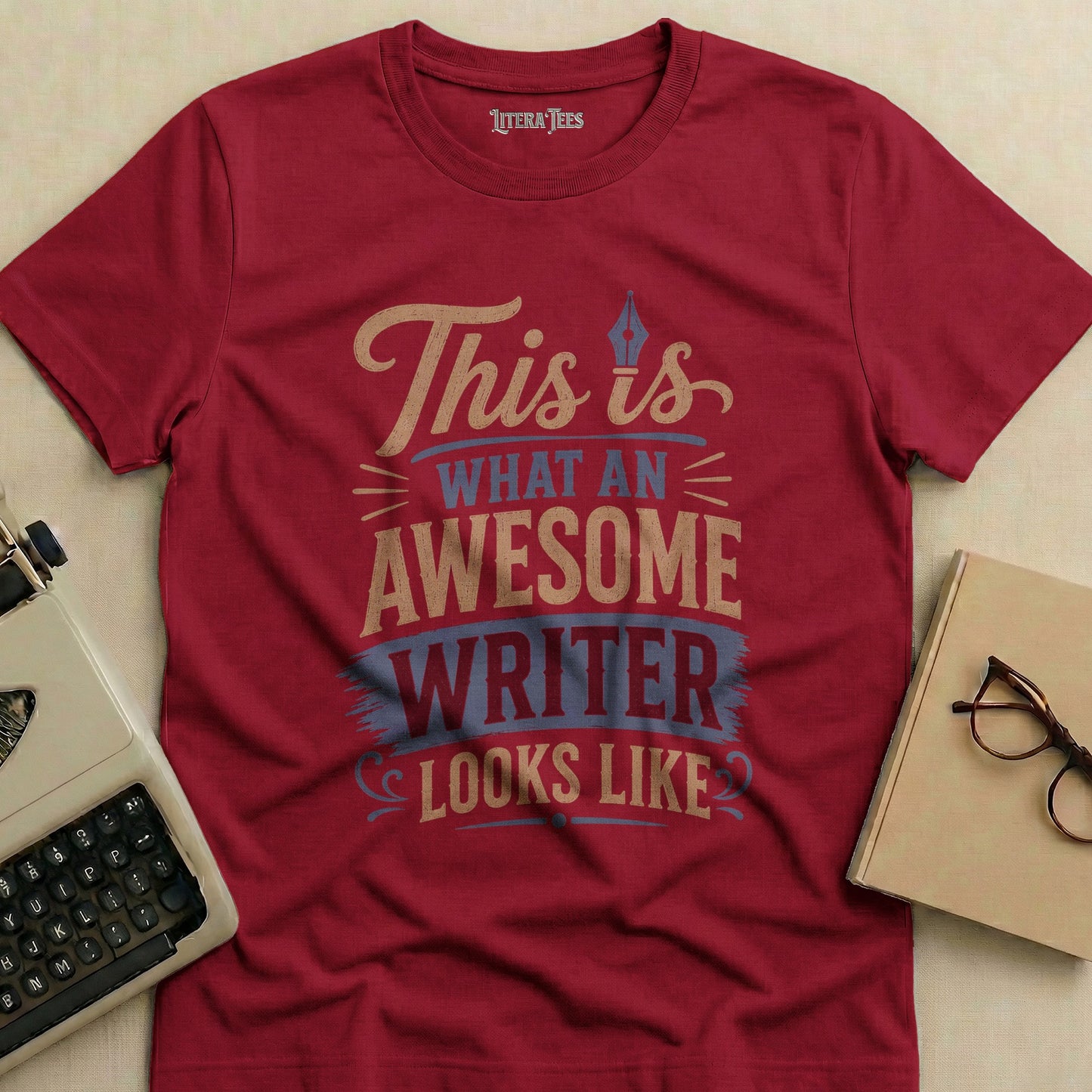 Maroon t-shirt with "This is what an awesome writer looks like" in beige and blue text.