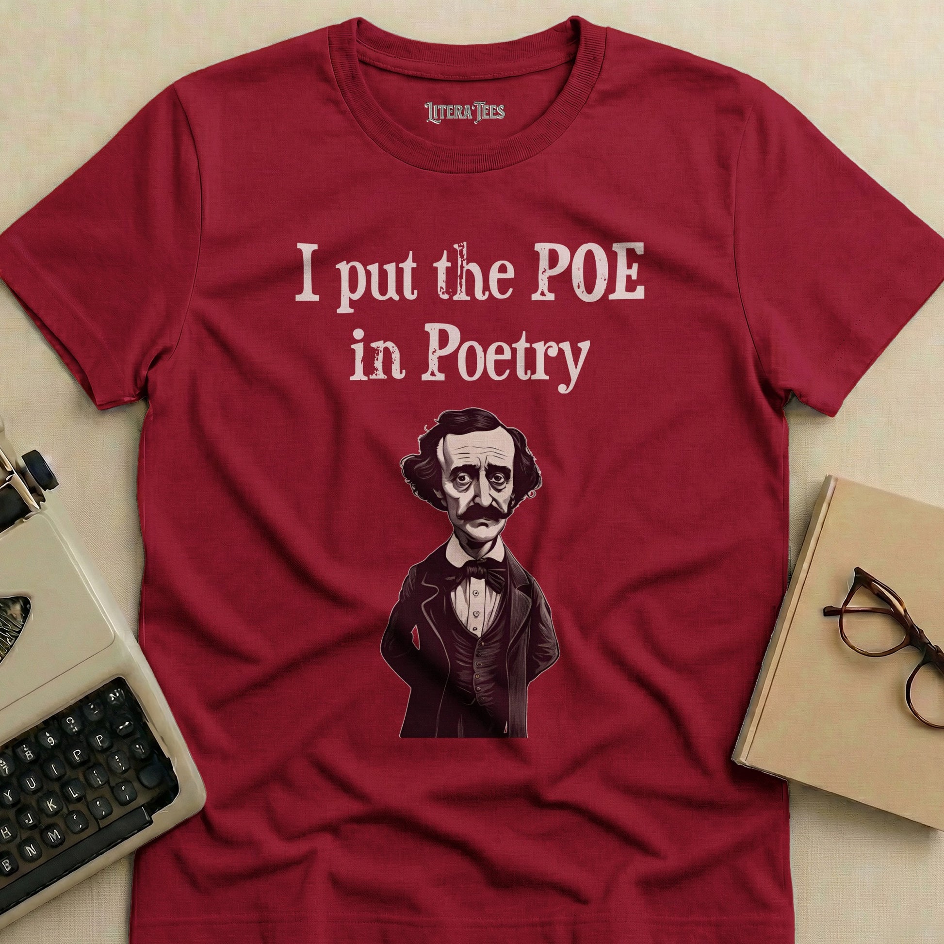 Maroon t-shirt with "I put the POE in Poetry" text and Edgar Allan Poe illustration.