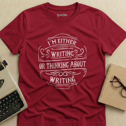 Maroon t-shirt with "I'm Either Writing or Thinking About Writing" text.