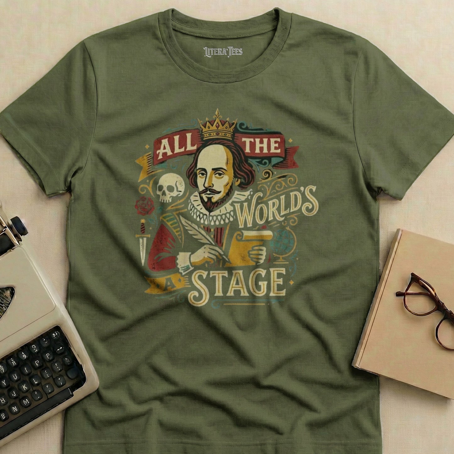 T-shirt graphic with Shakespeare writing on scroll, "All the World's Stage" text.