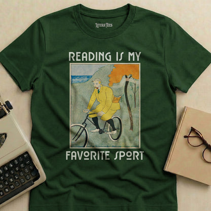 Green t-shirt with "Reading is my favorite sport" and artwork of a person cycling.