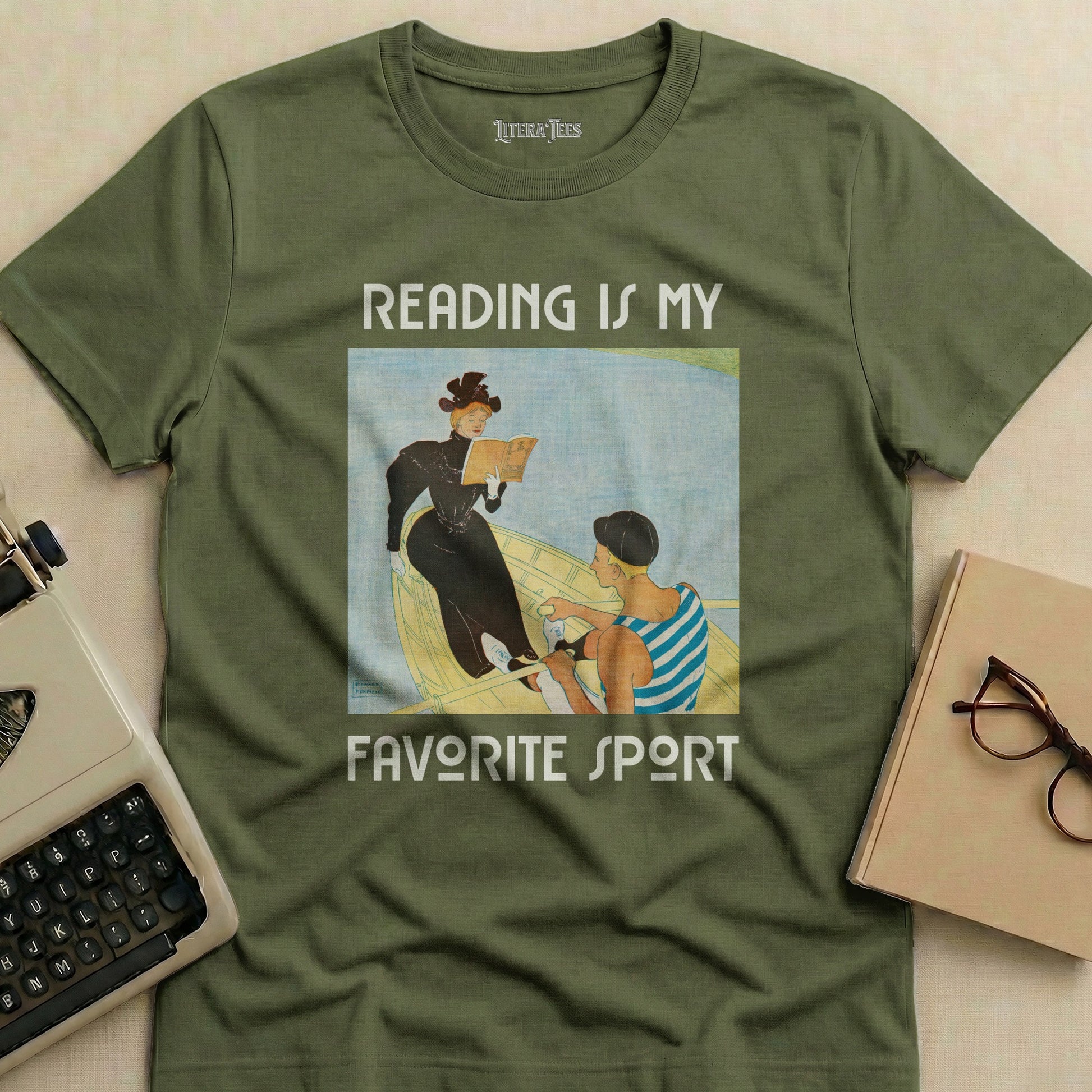 Olive green t-shirt with "READING IS MY FAVORITE SPORT" and vintage illustration.