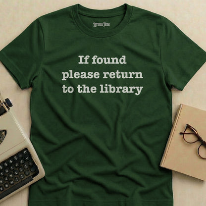 Green t-shirt with "If found please return to the library" text.