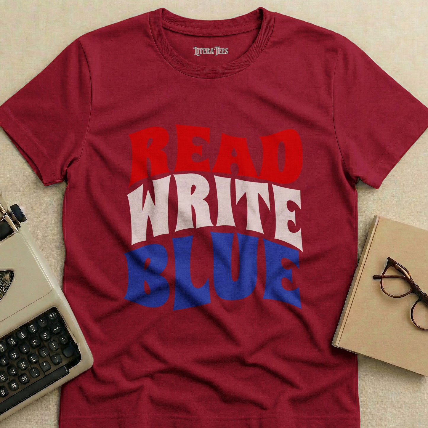 Maroon t-shirt with "READ WRITE BLUE" text in red, white, and blue.