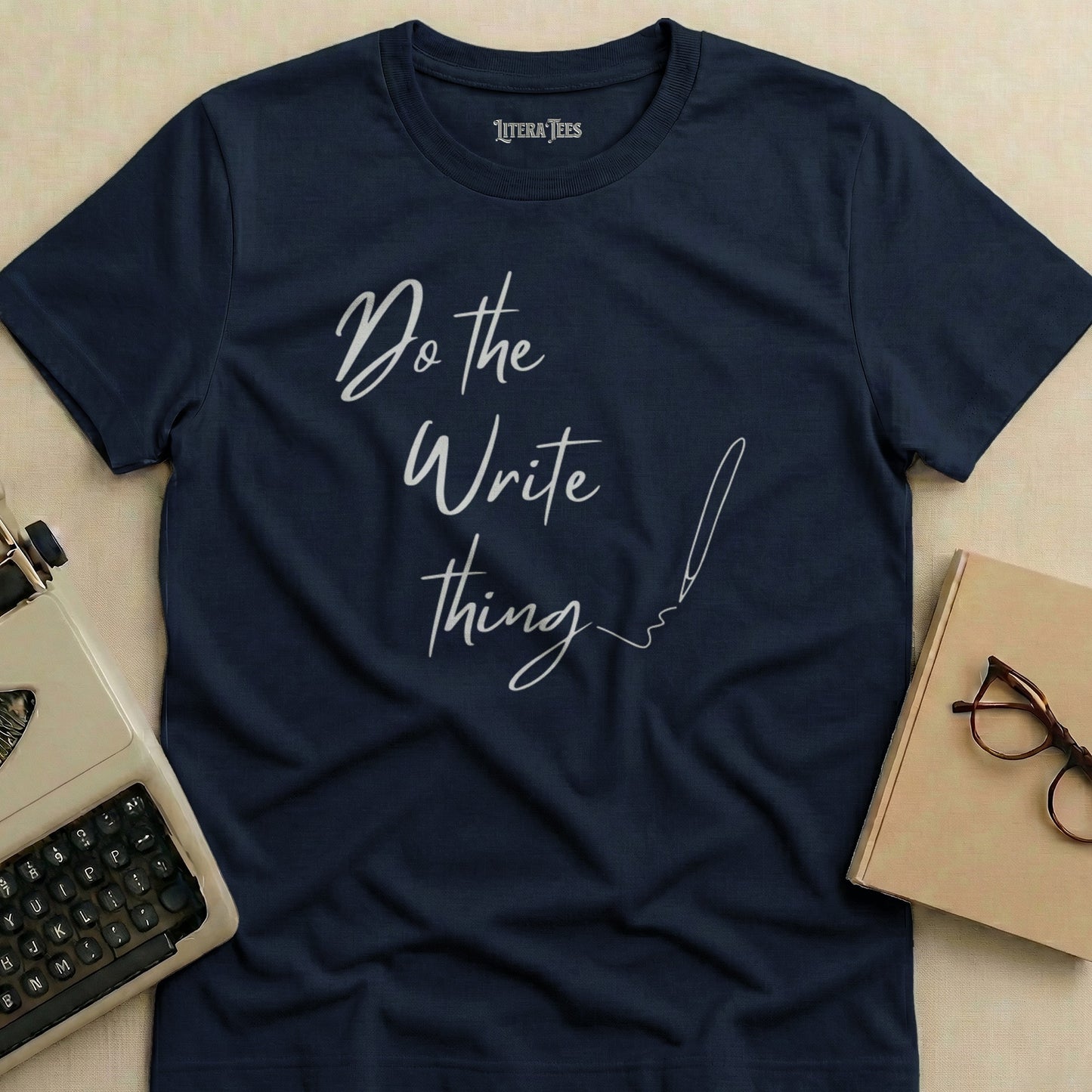 Navy t-shirt with "Do the Write thing" text and a pen illustration.