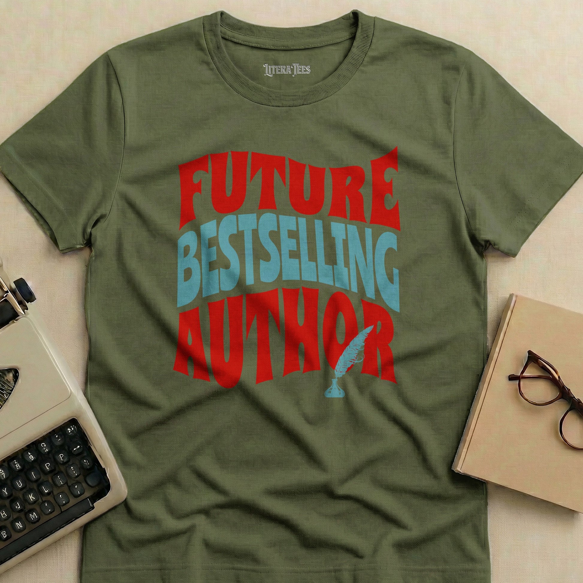 Olive green t-shirt with "FUTURE BESTSELLING AUTHOR" in red and blue lettering.