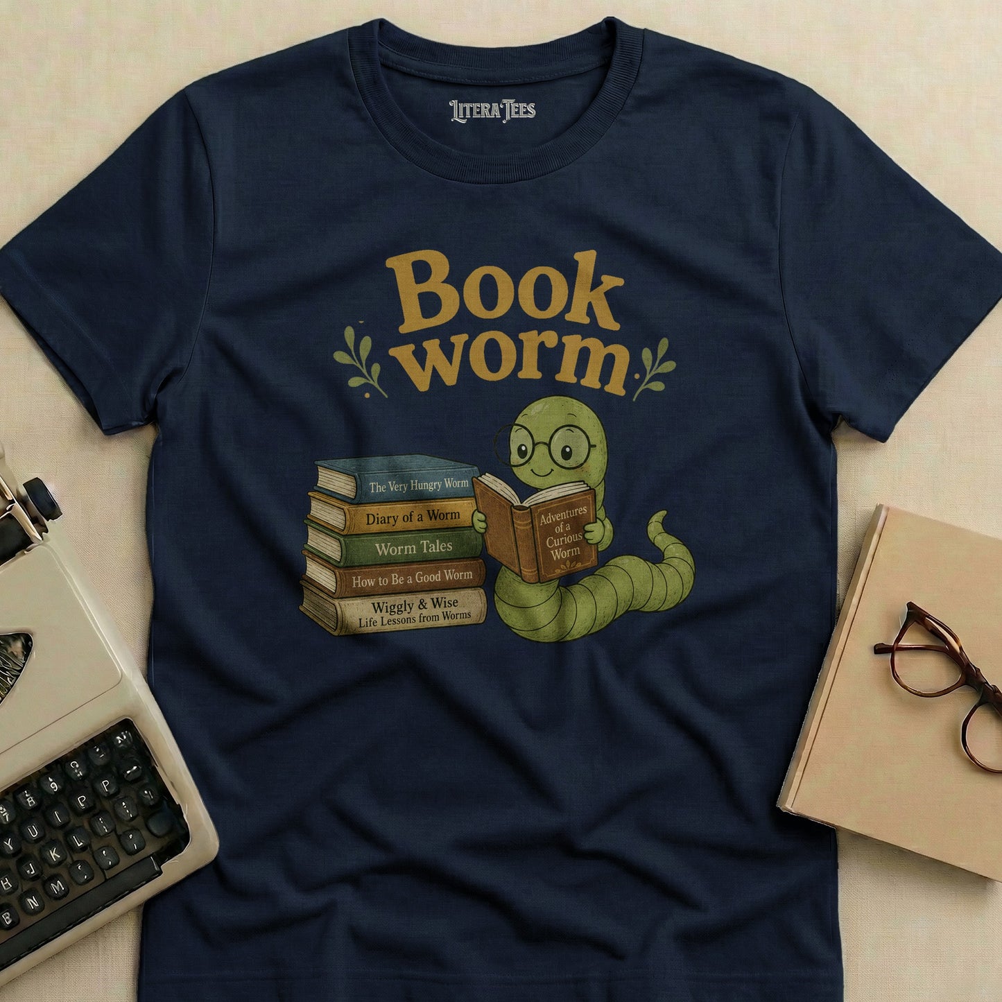 Dark blue t-shirt with a "Book worm" graphic featuring a worm reading a book.