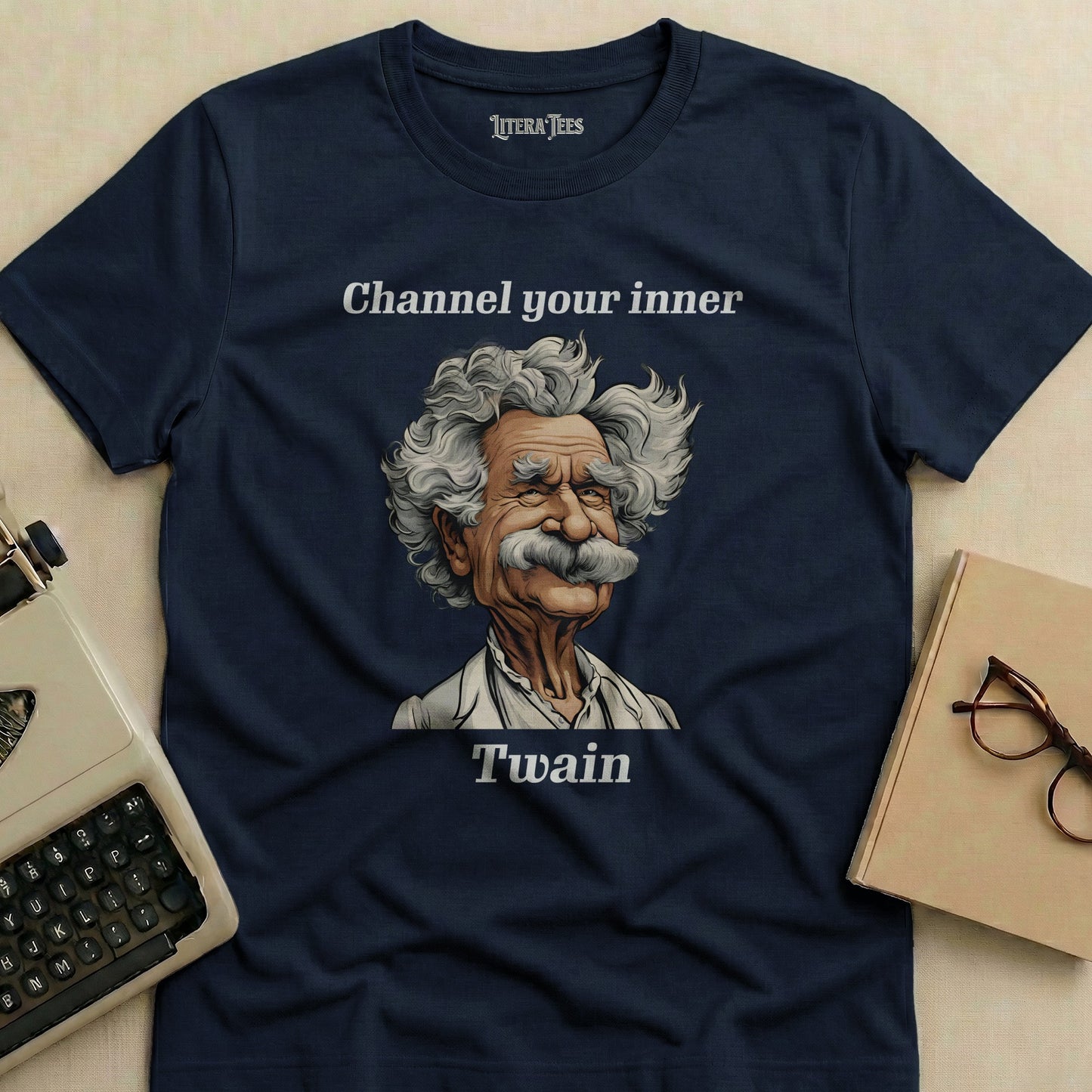 Navy t-shirt with Mark Twain illustration and text "Channel your inner Twain".