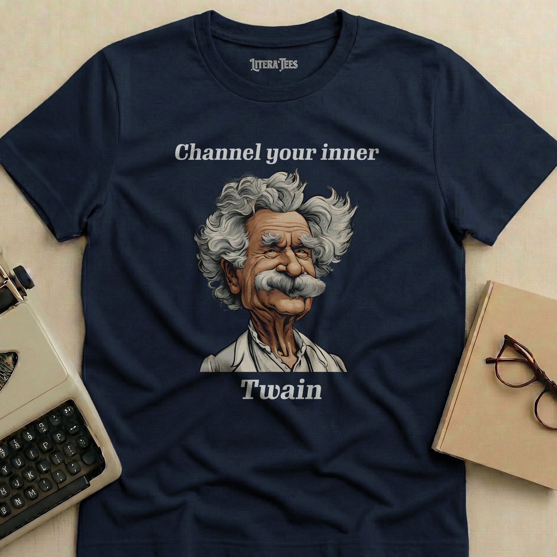 Navy t-shirt with Mark Twain illustration and text "Channel your inner Twain".