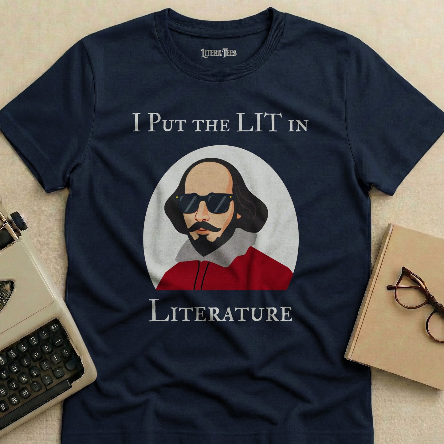 Navy t-shirt with "I Put the Lit in Literature" and Shakespeare graphic.