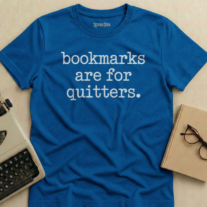 Blue t-shirt with white text "bookmarks are for quitters."