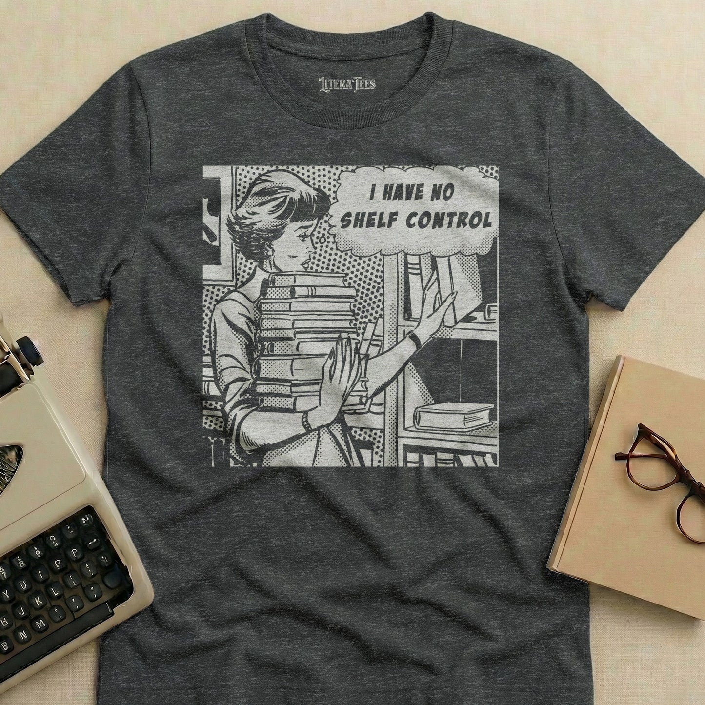 T-shirt with pop art graphic reading "I HAVE NO SHELF CONTROL."