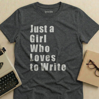 Dark grey t-shirt with white text "Just a Girl Who Loves to Write".