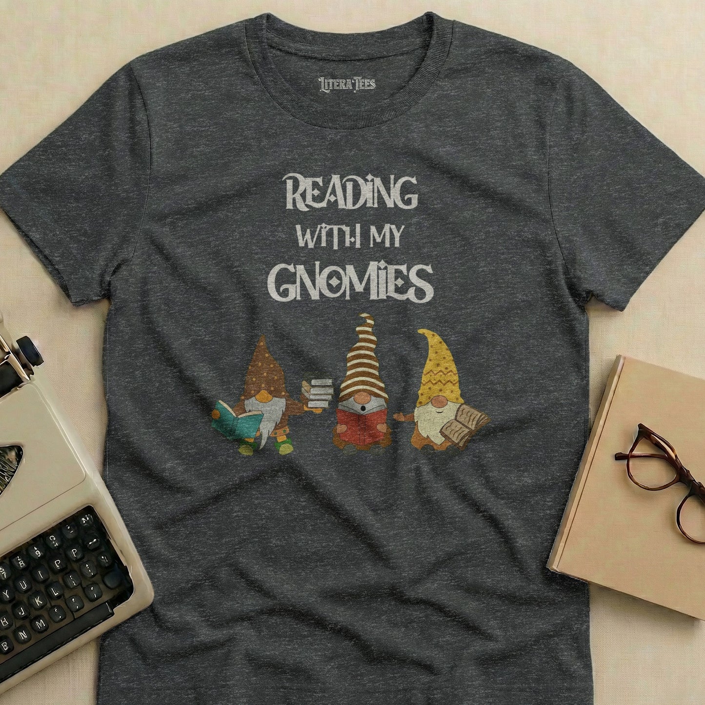 Dark grey t-shirt with "Reading With My Gnomies" and three gnomes reading books.