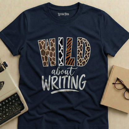 Navy t-shirt with "WILD about WRITING" in animal print and distressed text.