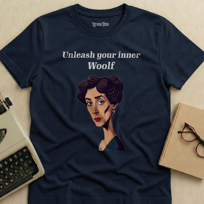 Navy t-shirt with "Unleash your inner Woolf" text and Virginia Woolf illustration.