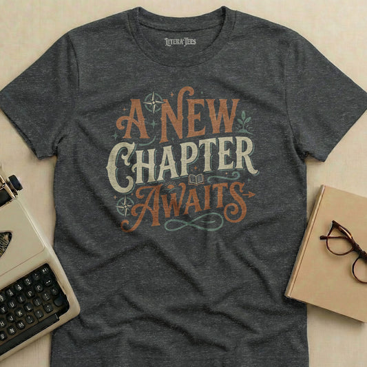 Dark grey t-shirt with "A New Chapter Awaits" in distressed lettering.