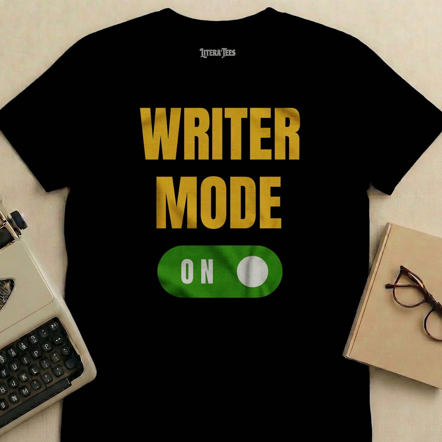 Black t-shirt with "WRITER MODE ON" text and a toggle switch.