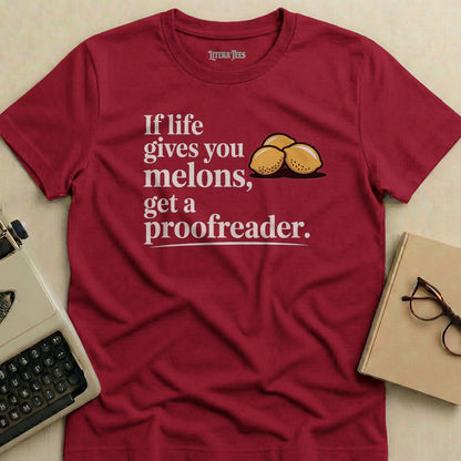 Maroon t-shirt with "If life gives you melons, get a proofreader" and three lemons.