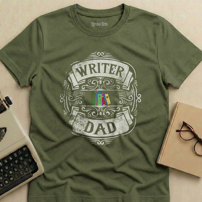 Olive green t-shirt with "Writer Dad" and stacked books graphic.