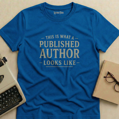 Blue t-shirt with "THIS IS WHAT A PUBLISHED AUTHOR LOOKS LIKE" in gray text.