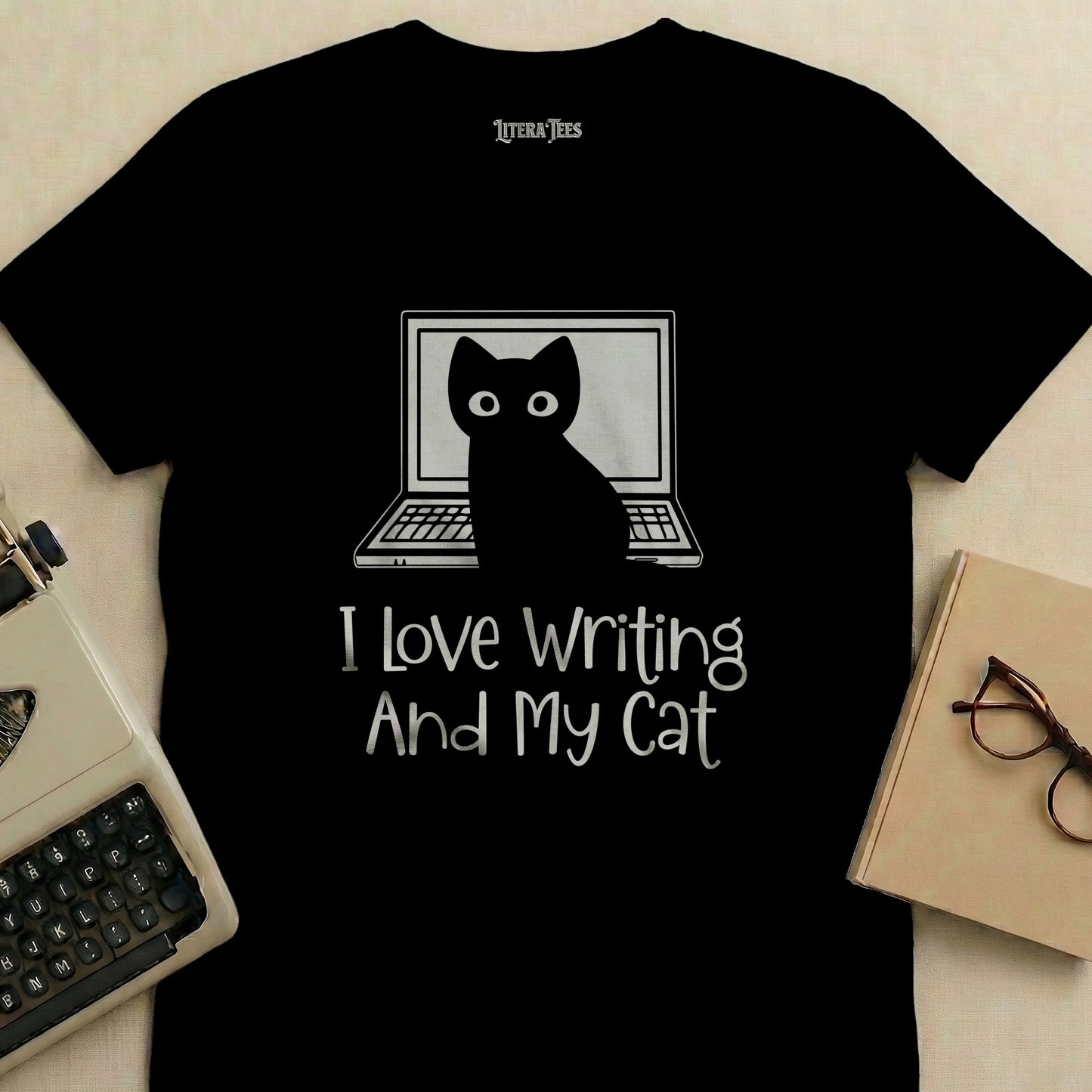 Black t-shirt with "I Love Writing And My Cat" and a cat at a laptop.