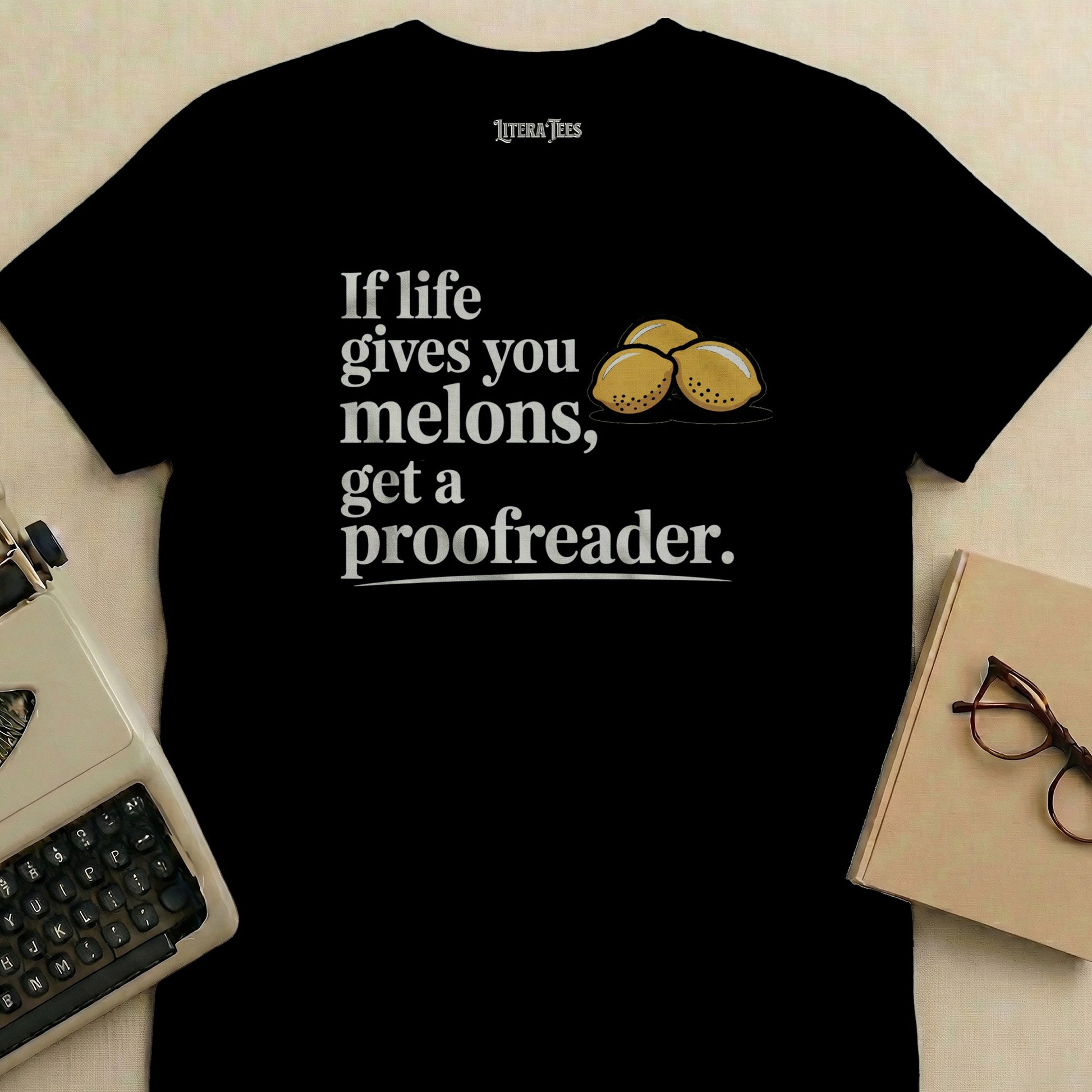 Black t-shirt with text "If life gives you melons, get a proofreader."