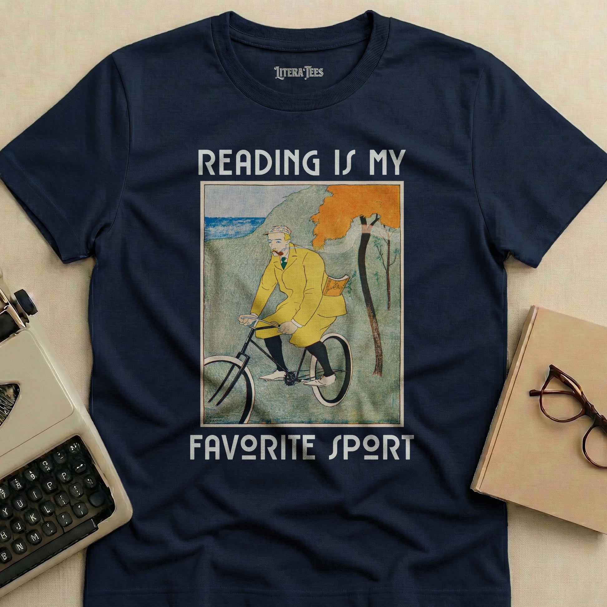 Navy t-shirt with "Reading Is My Favorite Sport" and a cycling illustration.