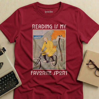 Maroon t-shirt with "READING IS MY FAVORITE SPORT" and a bicycle illustration.