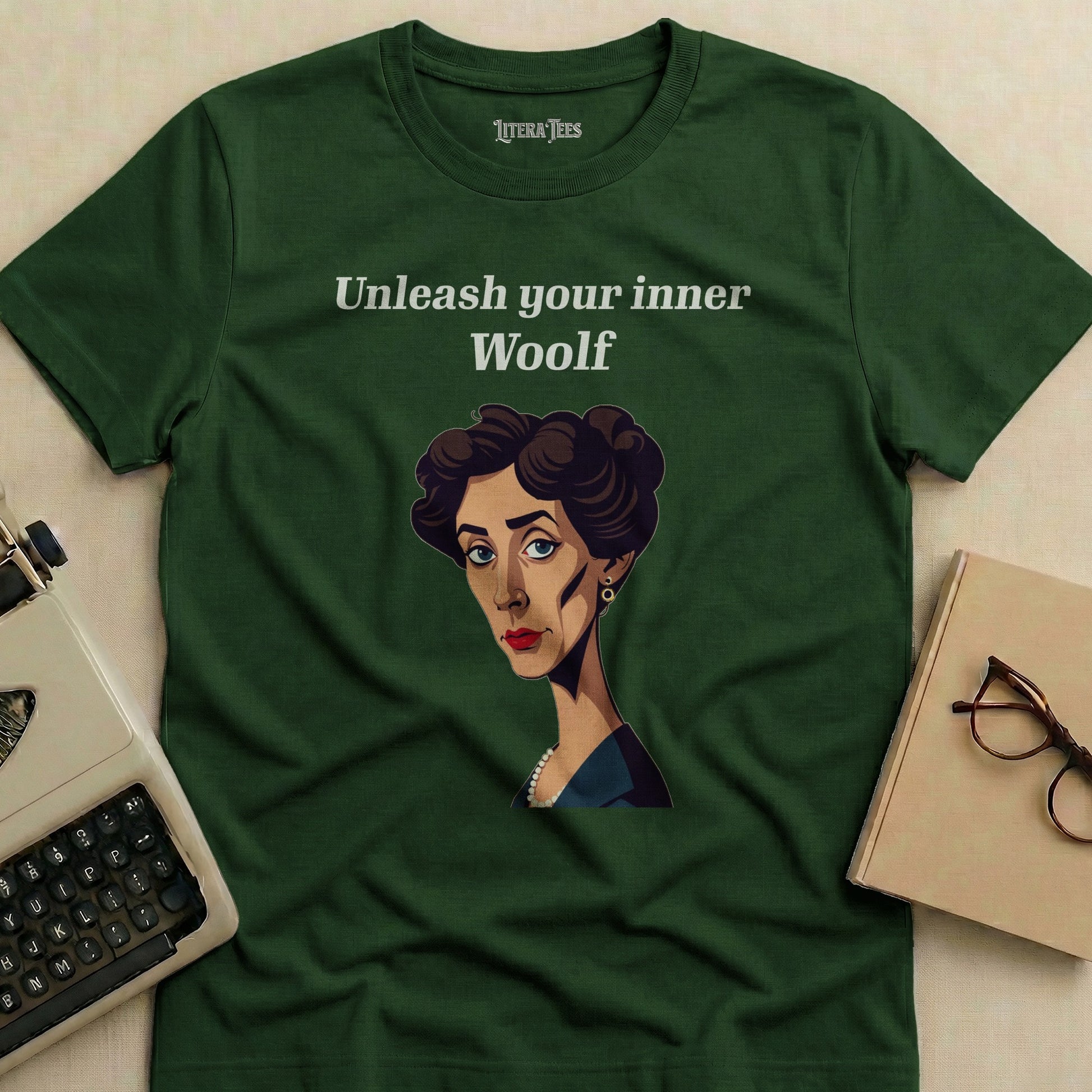 Green t-shirt with "Unleash your inner Woolf" and portrait of Virginia Woolf.