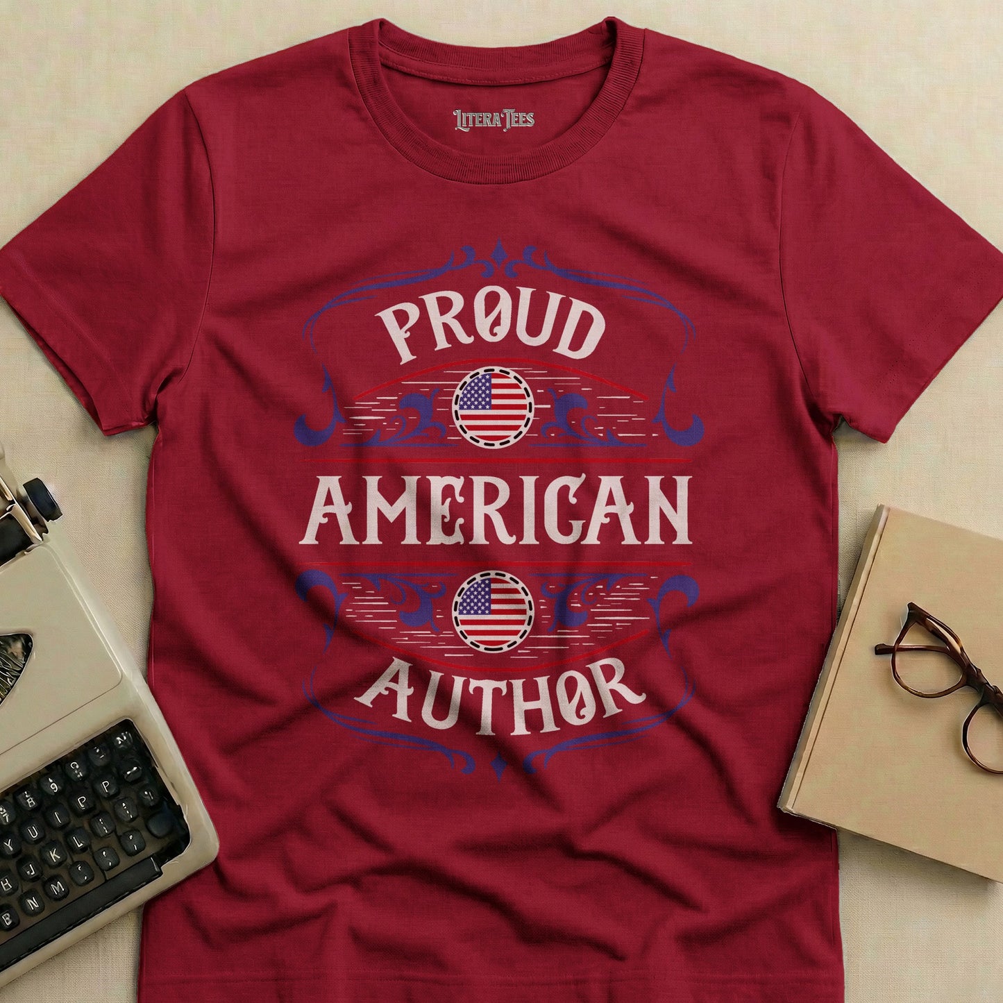 Burgundy t-shirt with "Proud American Author" text in vintage style.